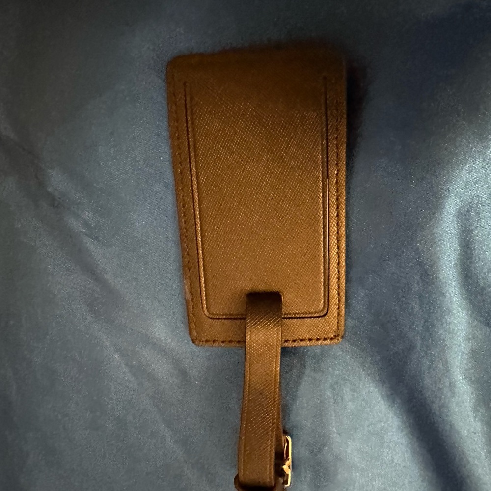 Coach travel bag tag